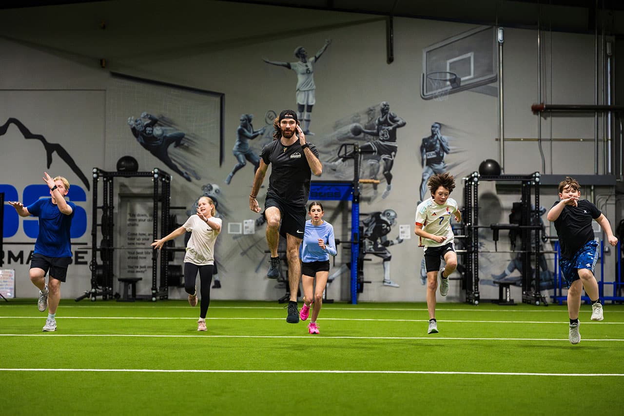 Coach Christian Parr leading exercise