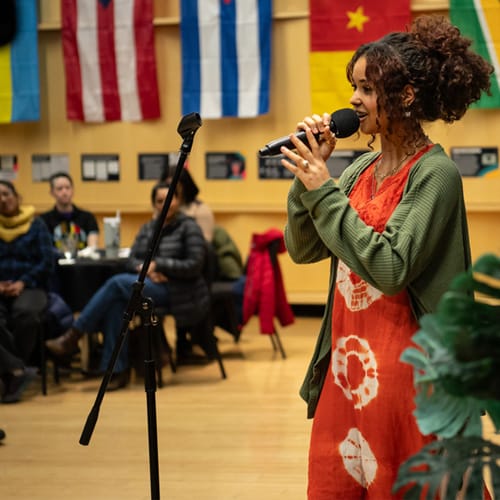 Woman speaking at the Black History Month Celebration Dinner at COCC