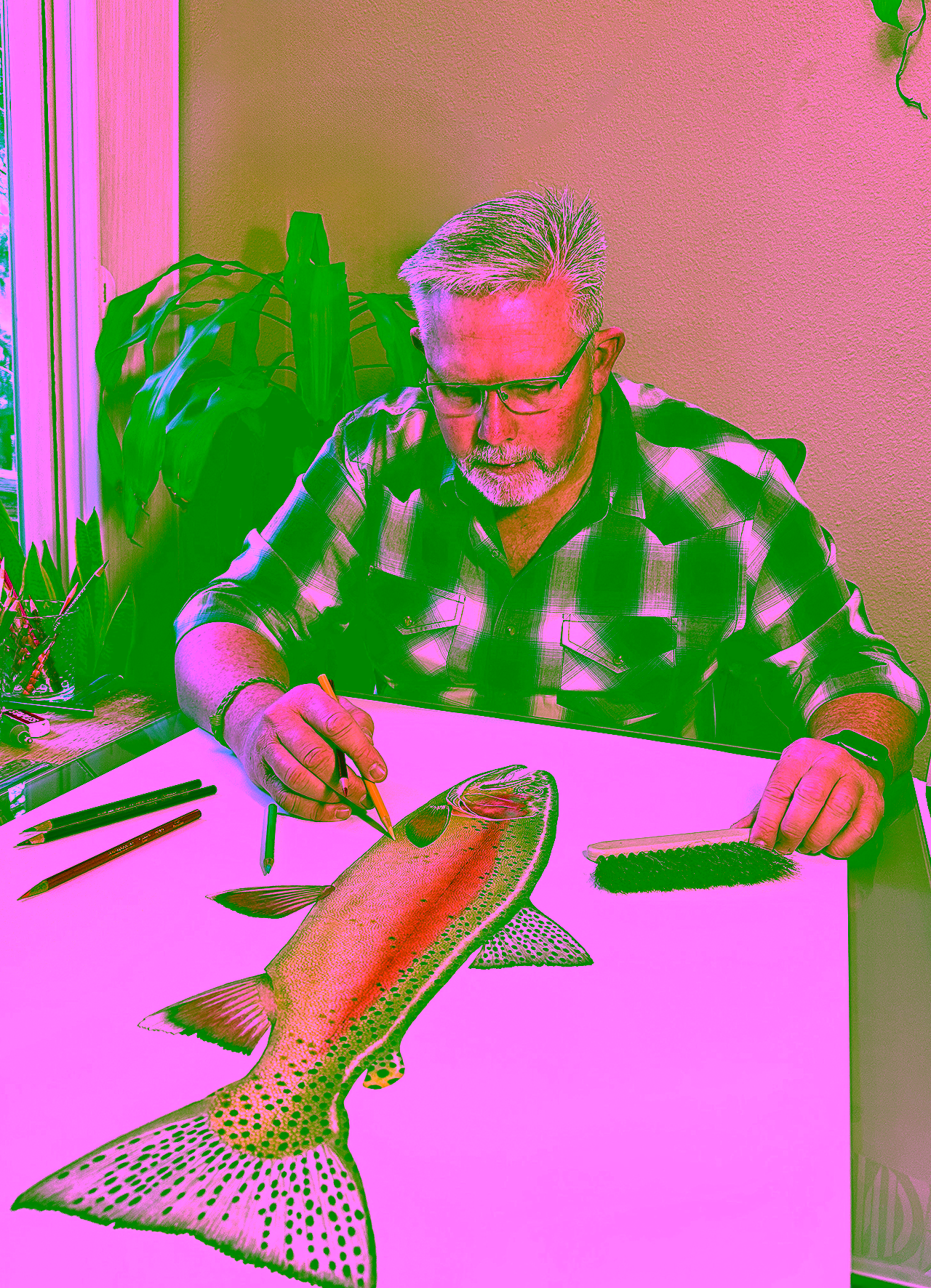 Tye Krueger illustrating a rainbow trout