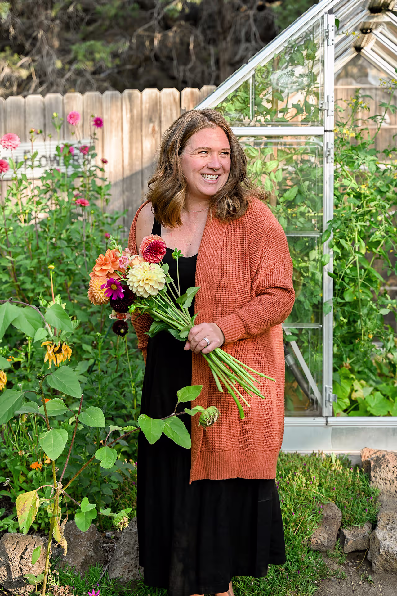 Laurel Ludwicki holding a batch of picked flowers in Central Oregon