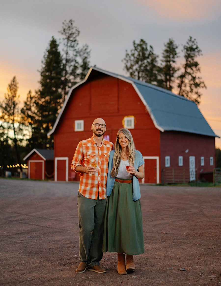 John and Renee Herman owners of Lazy Z Ranch Wines in front of their barn