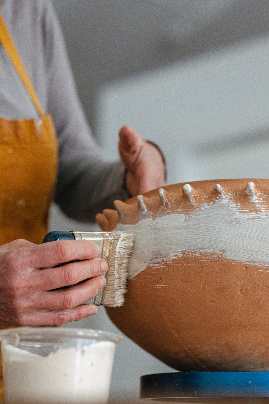 HWH ceramics painting a bowl