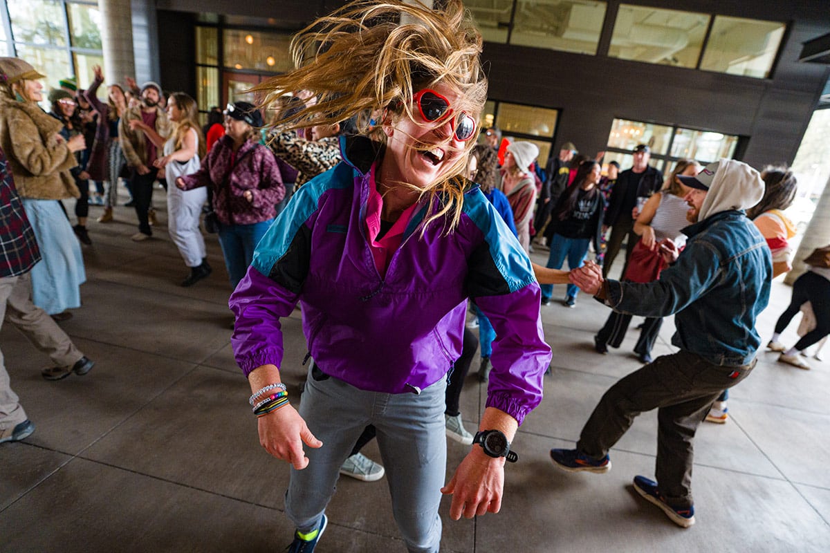 Woman dancing at a get up and groove dance party in Bend.