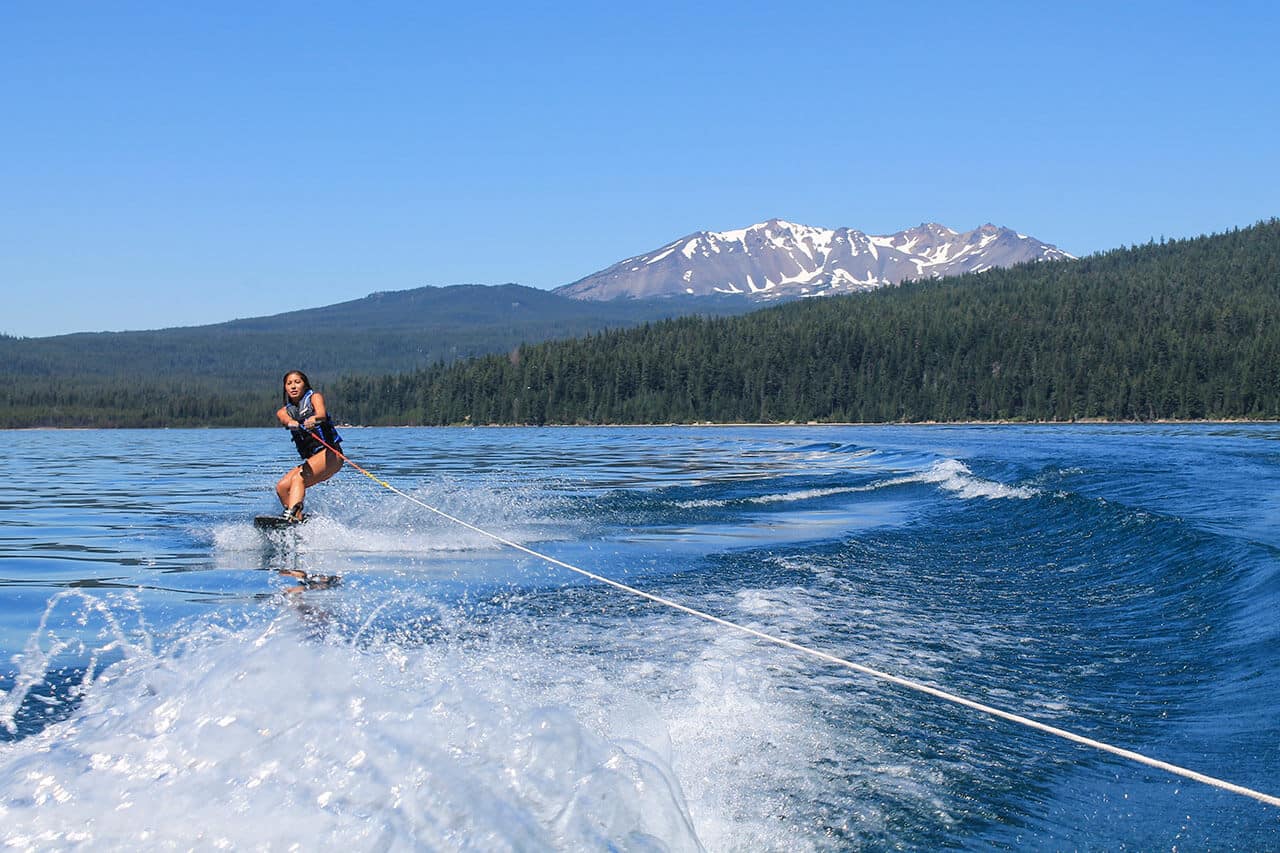 Woman boating on Crescent Lake in Oregon