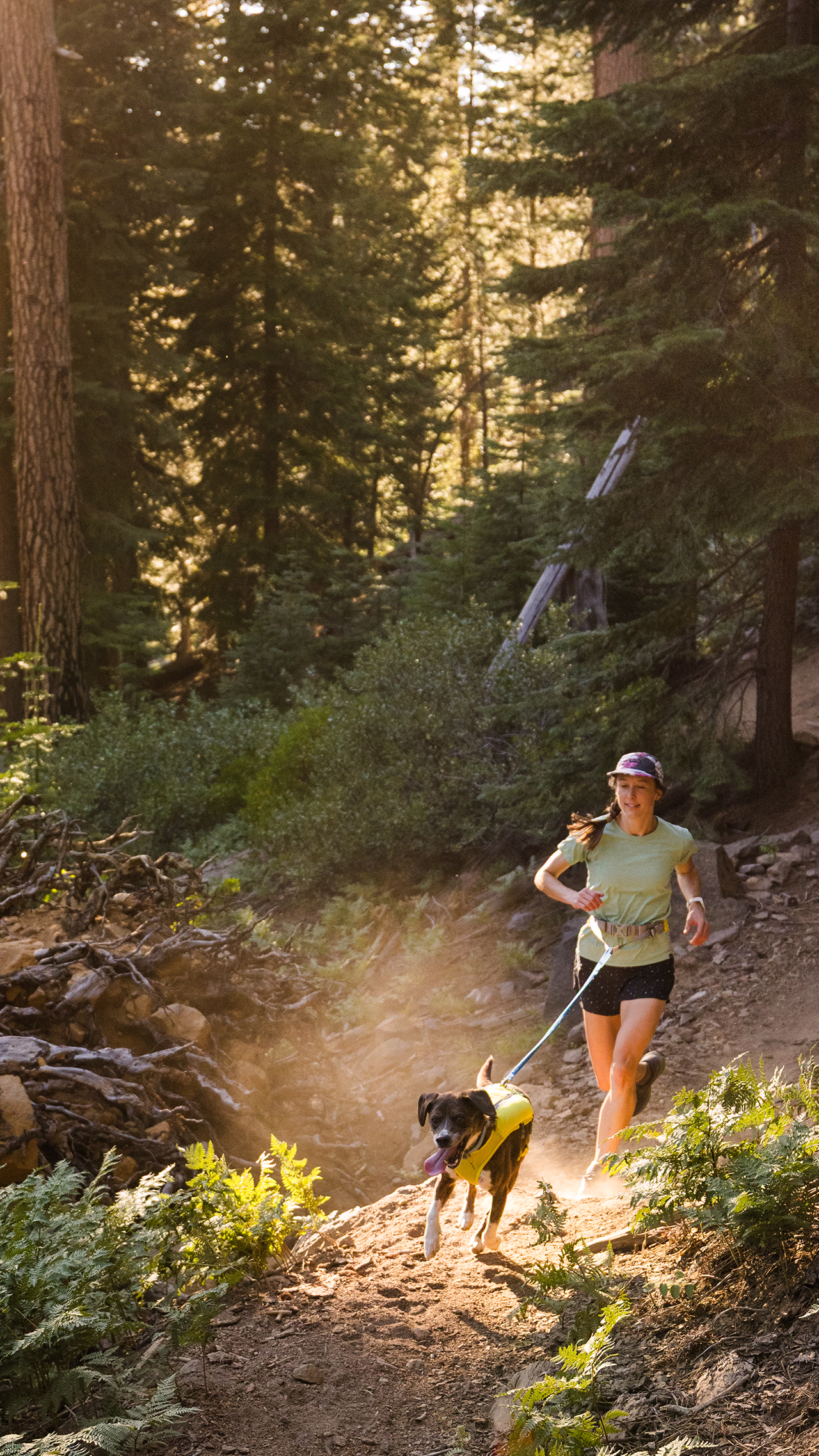 A woman and her dog run North Fork to Farewell Loop at Tumalo Falls