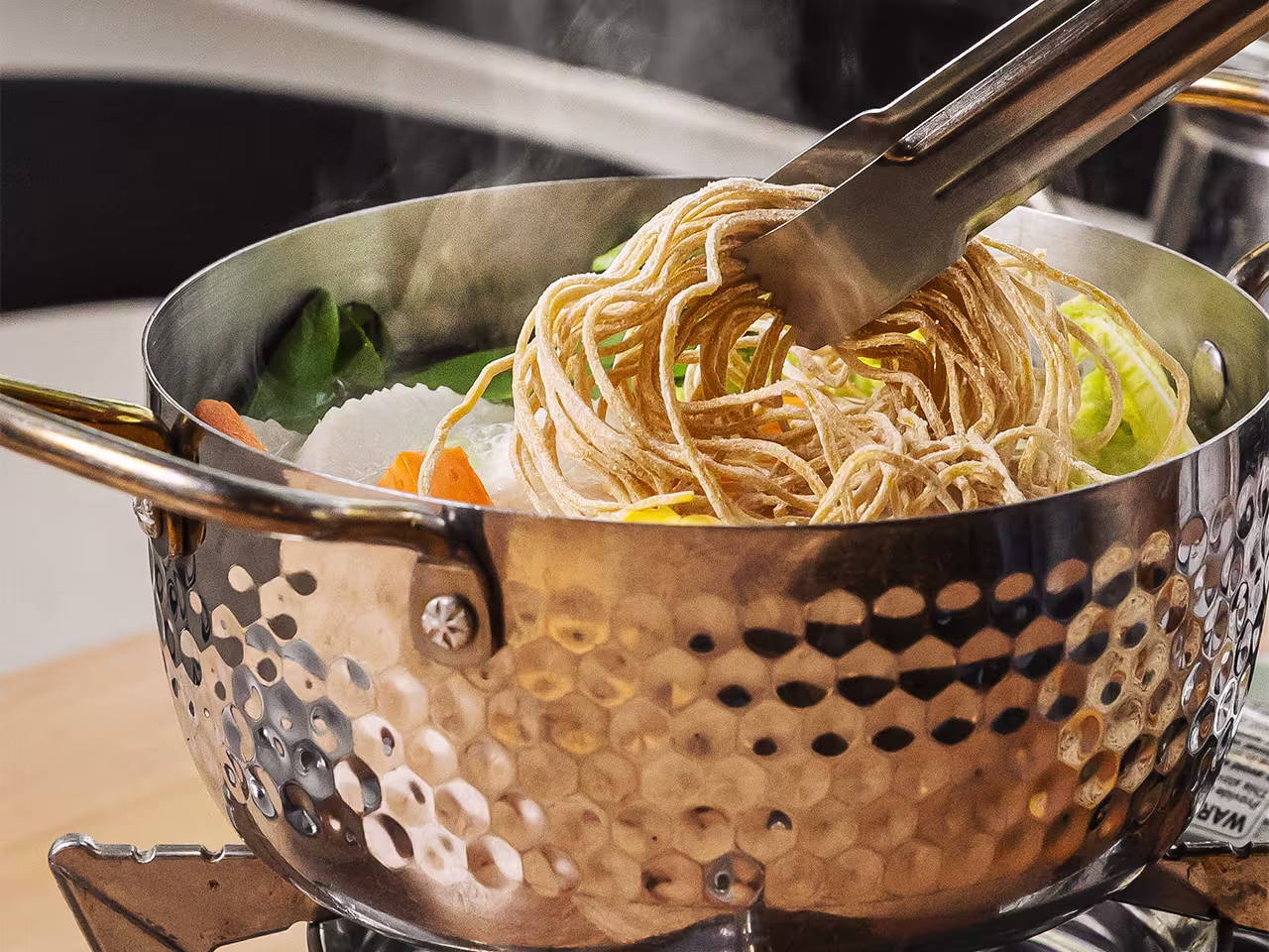 At Sen, a hot pot’s ingredients are cooked at the table