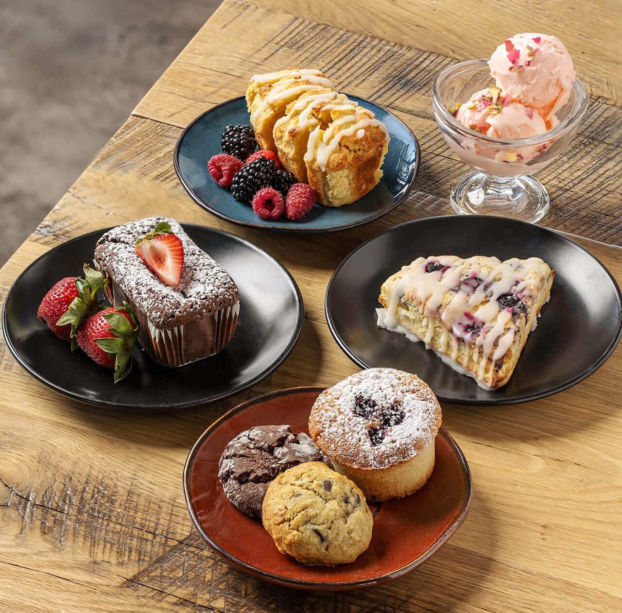 A variety of Blissful Spoon breads and pastries plated on a table