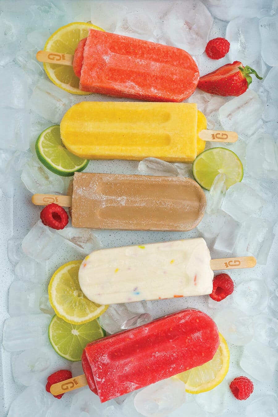 Aerial shot of 5 flavors of Glory Popsicles