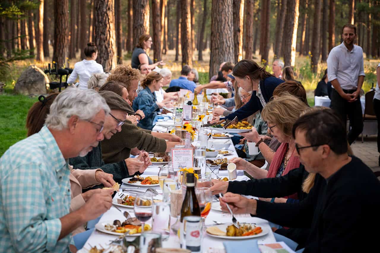 family style dinner outside at FivePine Lodge