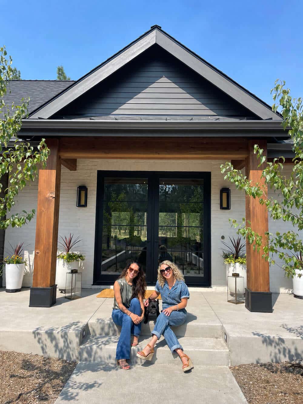 Danielle Gates and Kirsten Milne, co-founders of MG Estate Management & Concierge sitting outside of a home