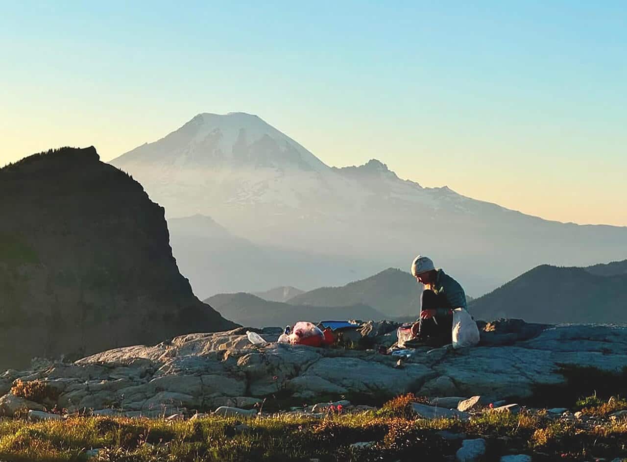 woman at her camp on the PCT trail