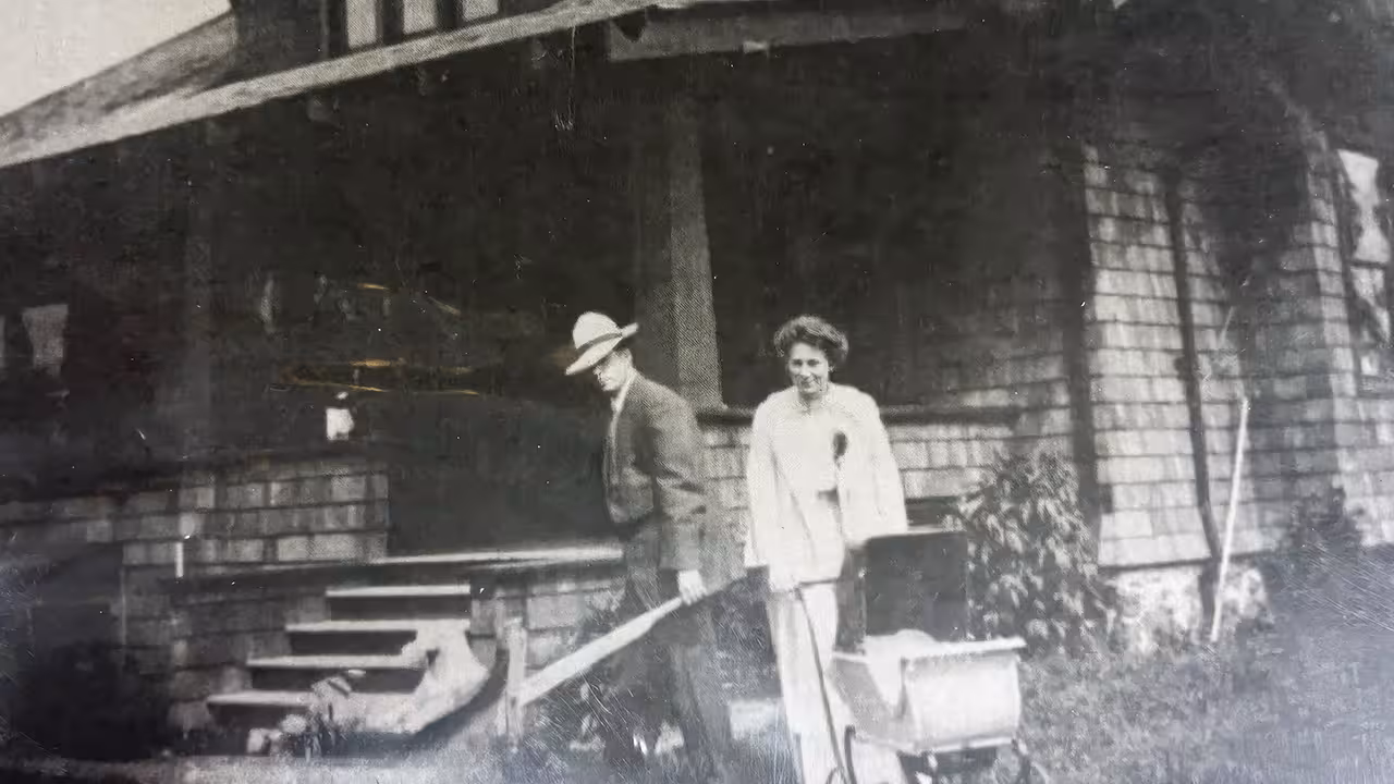 Historic photo of the Putnams in front of their house