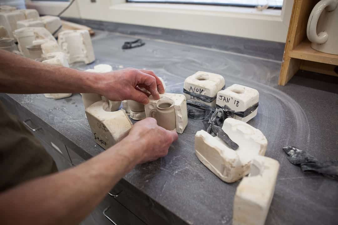 Installation artist Bill Cravis uses clay in Bend, Oregon