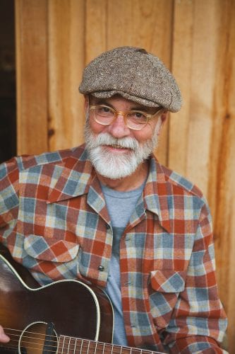 Dennis McGregor Playing Guitar